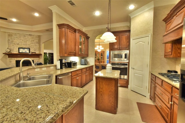 13111 Saint Orlin Way, Talty, TX 75126 - kitchen with stainless steel appliances, a sink, ornamental molding, decorative backsplash, and glass insert cabinets