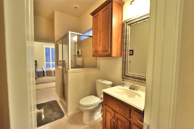 13111 Saint Orlin Way, Talty, TX 75126 - full bath featuring vanity, tile patterned floors, toilet, and a stall shower