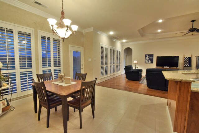 13111 Saint Orlin Way, Talty, TX 75126 - dining space featuring crown molding, a chandelier, arched walkways, recessed lighting, and baseboards