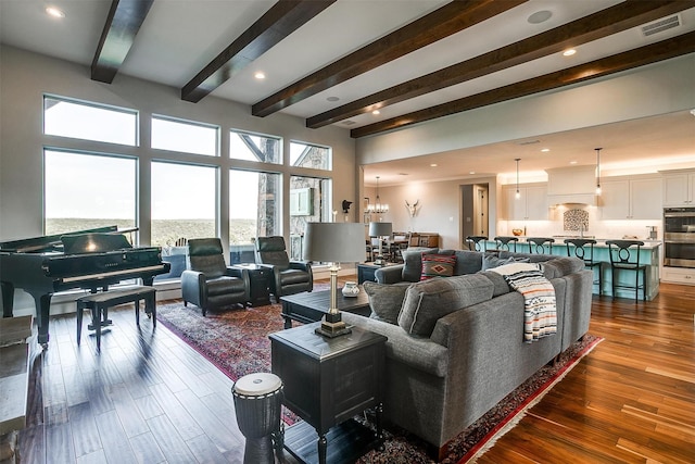 8225 Scotscraig Ct, Cleburne, TX 76033 - living area featuring beam ceiling, a chandelier, plenty of natural light, dark wood finished floors, and recessed lighting