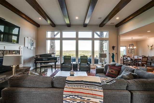 8225 Scotscraig Ct, Cleburne, TX 76033 - living area with a chandelier, beamed ceiling, wood finished floors, and recessed lighting