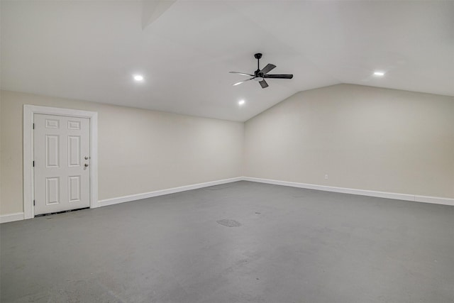 empty room with vaulted ceiling, concrete flooring, baseboards, ceiling fan, and recessed lighting