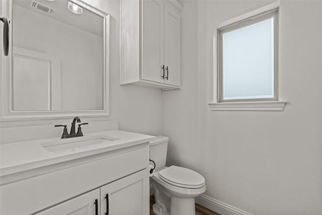 2017 Antler Loop, Poolville, TX 76487 - half bath with vanity, baseboards, toilet, and visible vents