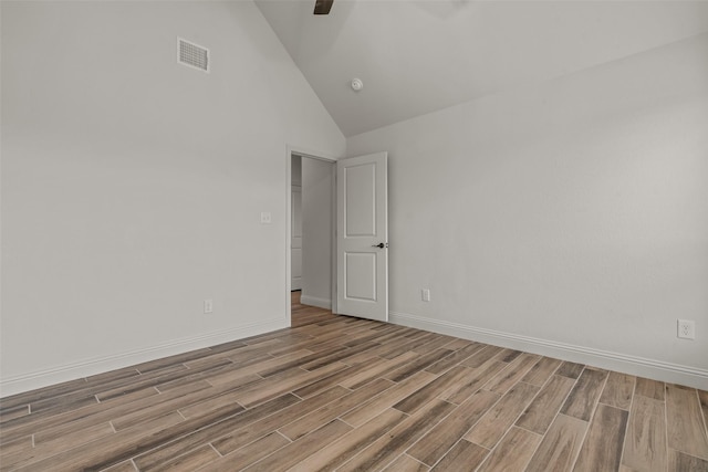 2017 Antler Loop, Poolville, TX 76487 - unfurnished room with baseboards, high vaulted ceiling, wood finished floors, and visible vents