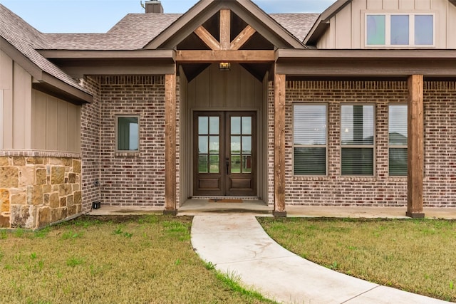 2017 Antler Loop, Poolville, TX 76487 - property entrance featuring french doors, board and batten siding, roof with shingles, and brick siding