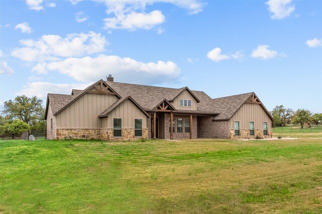 2017 Antler Loop, Poolville, TX 76487 - craftsman-style house featuring fence, board and batten siding, stone siding, and a front yard