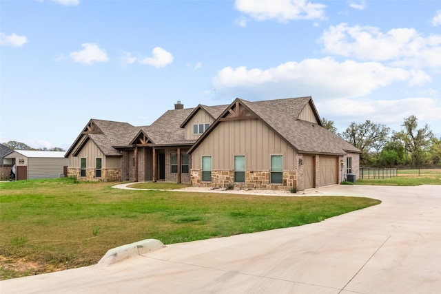 2017 Antler Loop, Poolville, TX 76487 - craftsman house featuring board and batten siding, driveway, and stone siding