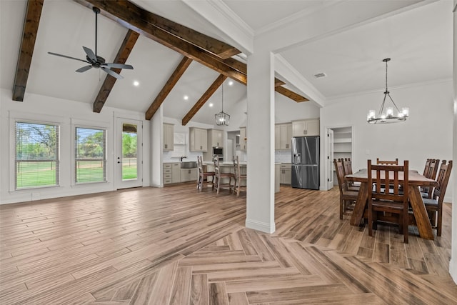 2017 Antler Loop, Poolville, TX 76487 - living area with visible vents, lofted ceiling with beams, ceiling fan with notable chandelier, ornamental molding, and recessed lighting