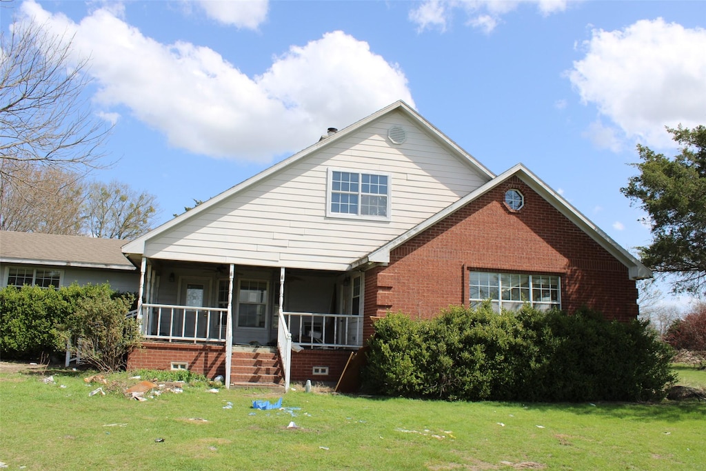 938 County Road 4900, Trenton, TX 75490 - view of front of house featuring a front yard and brick siding