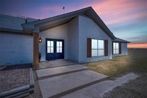 13125 Friendship Rd, Pilot Point, TX 76258 - view of exterior entry at dusk