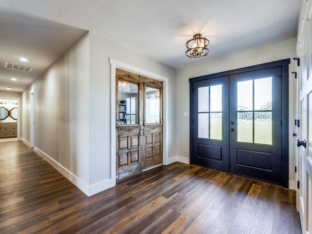13125 Friendship Rd, Pilot Point, TX 76258 - foyer featuring french doors and dark wood-type flooring