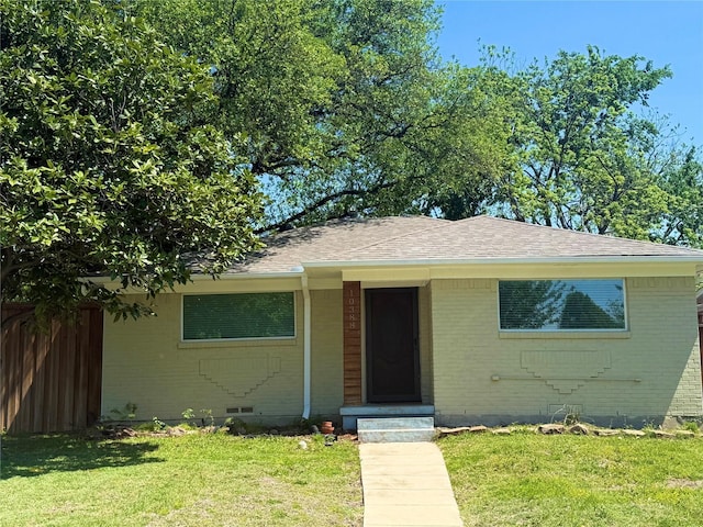 10388 Sandra Lynn Dr, Dallas, TX 75228 - view of front facade featuring brick siding and a shingled roof