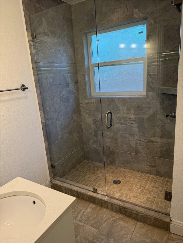 10388 Sandra Lynn Dr, Dallas, TX 75228 - full bathroom with a shower stall, plenty of natural light, and vanity