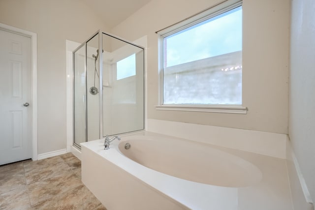 2760 Stoney Hollow Ln, Rockwall, TX 75087 - bathroom with a bath, a shower stall, and baseboards