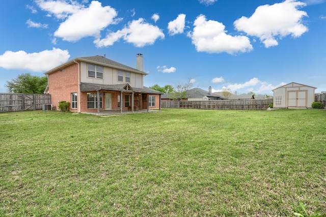 view of yard with a storage shed, cooling unit, a patio, and an outdoor structure