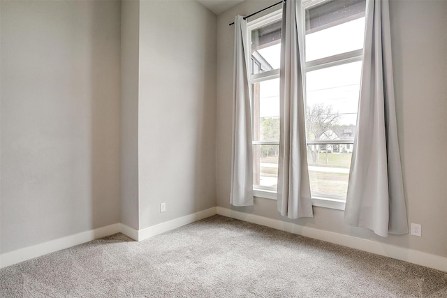 521 Echo Glade Ct, Azle, TX 76020 - spare room with light colored carpet, healthy amount of natural light, and baseboards