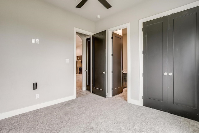 521 Echo Glade Ct, Azle, TX 76020 - unfurnished bedroom with light colored carpet, baseboards, ceiling fan, and ensuite bath