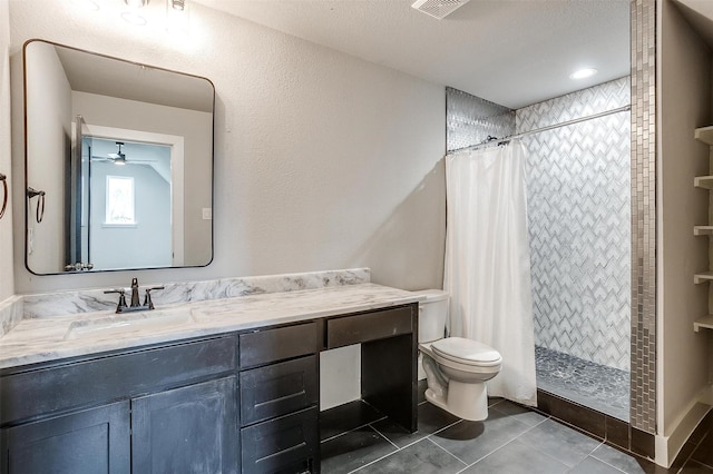 521 Echo Glade Ct, Azle, TX 76020 - bathroom featuring toilet, ceiling fan, a stall shower, and tile patterned flooring