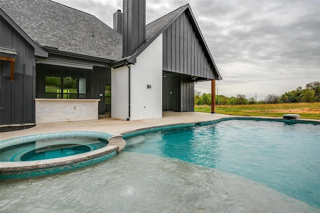 521 Echo Glade Ct, Azle, TX 76020 - view of pool with a patio area and a pool with connected hot tub