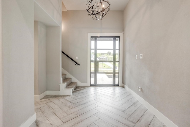 521 Echo Glade Ct, Azle, TX 76020 - entrance foyer with a chandelier, stairs, and baseboards