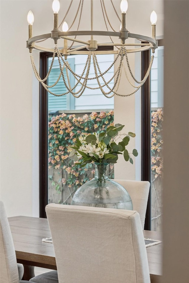 dining area with a notable chandelier