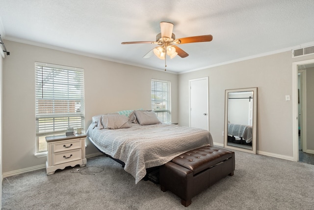 201 Volunteer Dr, Arlington, TX 76014 - carpeted bedroom featuring ornamental molding, baseboards, a ceiling fan, and visible vents