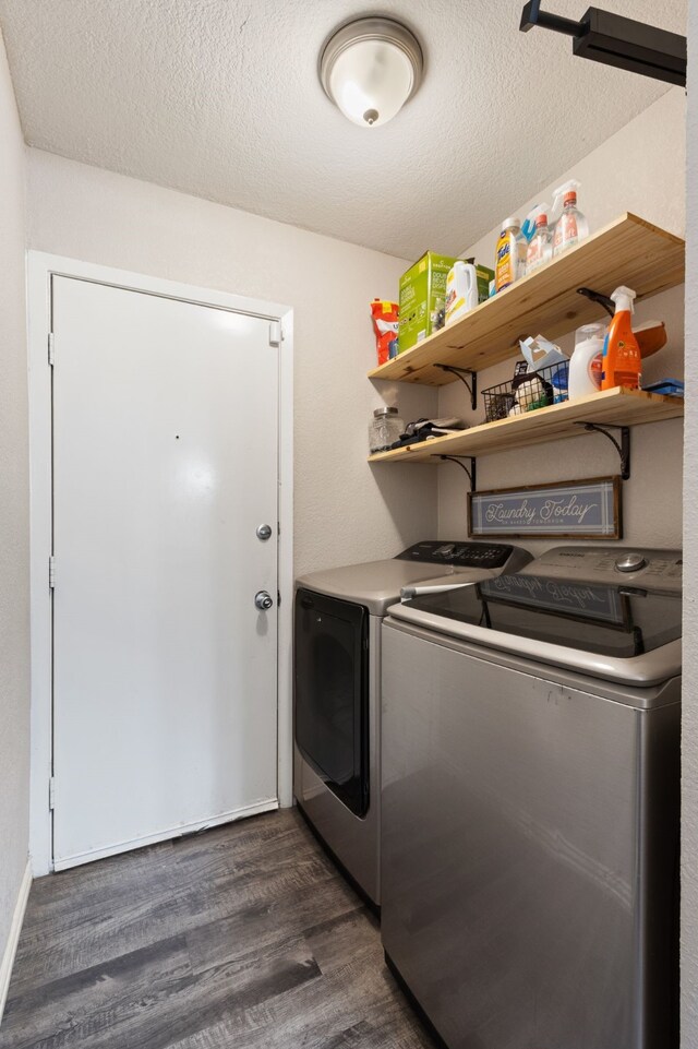 201 Volunteer Dr, Arlington, TX 76014 - clothes washing area with dark wood-type flooring, separate washer and dryer, laundry area, and a textured ceiling