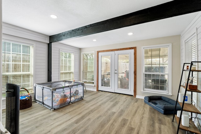 201 Volunteer Dr, Arlington, TX 76014 - interior space with french doors, wood finished floors, beam ceiling, and recessed lighting