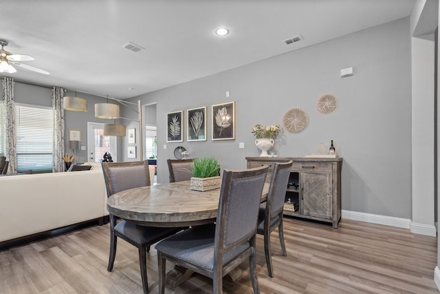 3724 Ranchers Rdg, Krum, TX 76249 - dining space featuring light wood finished floors, ceiling fan, recessed lighting, and baseboards