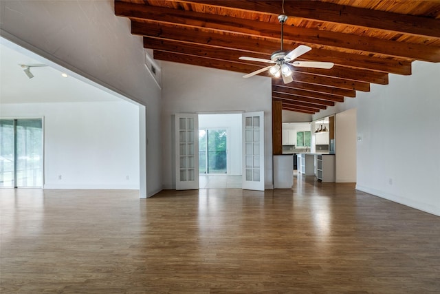 7219 Hickey Rd, Azle, TX 76020 - unfurnished living room with dark wood-type flooring, ceiling fan, wood ceiling with exposed beams, high vaulted ceiling, and baseboards