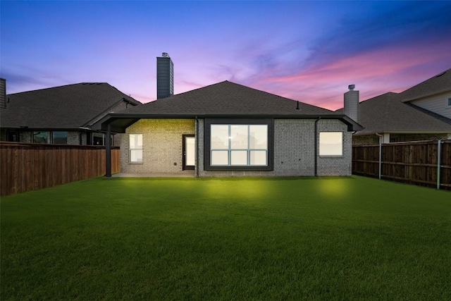 7745 Gatevine Ave, Joshua, TX 76058 - back of house featuring a chimney, brick siding, roof with shingles, and a patio
