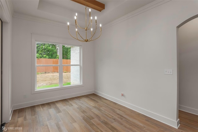 386 Newburn Ln, Shreveport, LA 71106 - spare room with arched walkways, light wood-style floors, and baseboards
