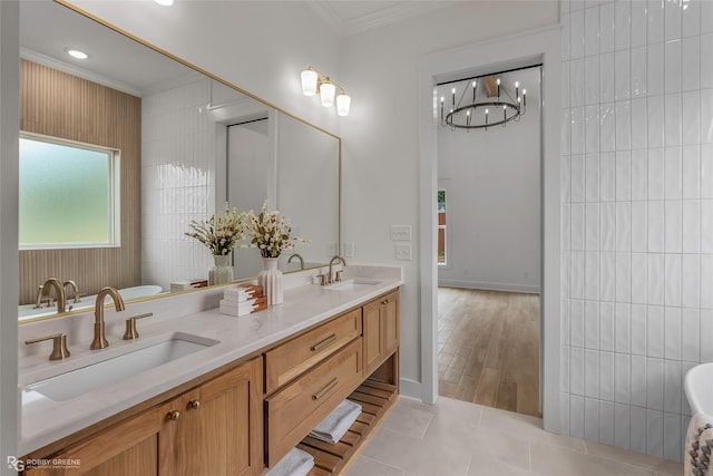 386 Newburn Ln, Shreveport, LA 71106 - bathroom featuring tile patterned flooring, ornamental molding, double vanity, and a sink