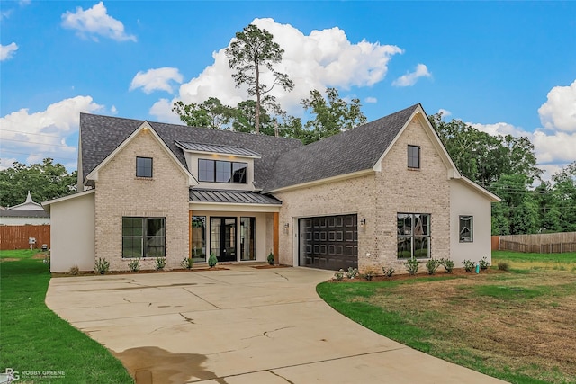 386 Newburn Ln, Shreveport, LA 71106 - view of front facade featuring fence, a shingled roof, a standing seam roof, and brick siding