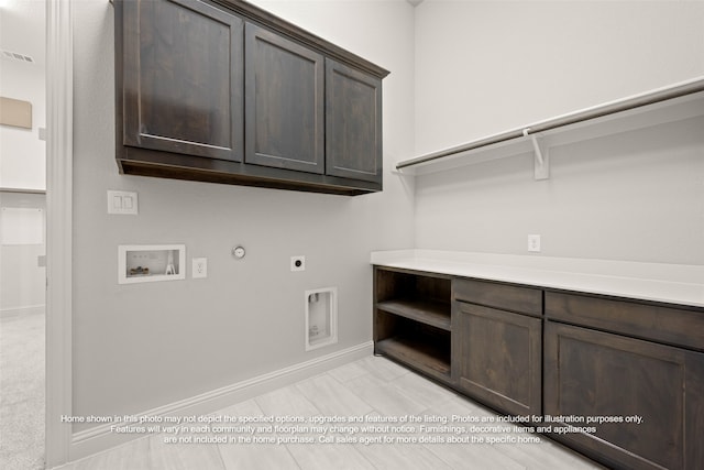 2613 Lee St, Burleson, TX 76028 - laundry area with cabinet space, hookup for an electric dryer, gas dryer hookup, and washer hookup