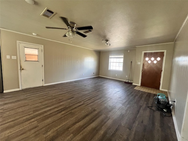 entryway featuring a ceiling fan, crown molding, dark wood-style floors, and visible vents