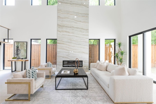 4218 Bonham St, Dallas, TX 75229 - living area featuring a high ceiling and a high end fireplace