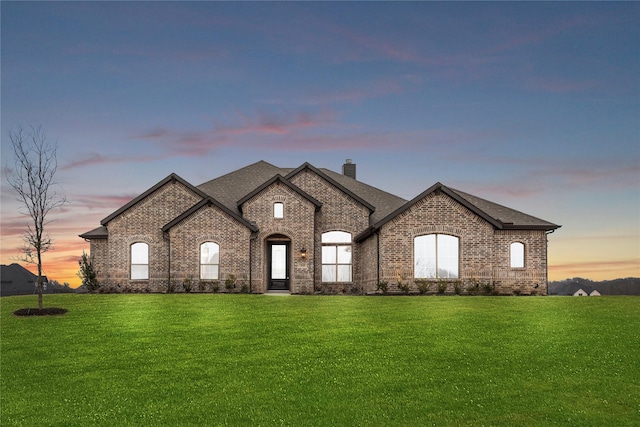 160 Waterview Dr, Gunter, TX 75058 - view of front of house featuring a lawn, brick siding, a chimney, and a shingled roof