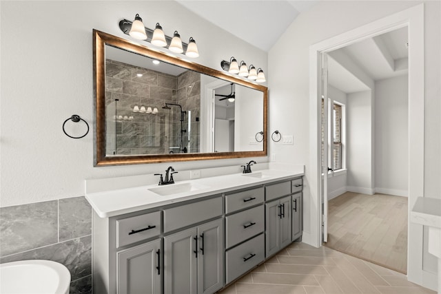 160 Waterview Dr, Gunter, TX 75058 - full bathroom with double vanity, tile walls, a shower stall, and a sink