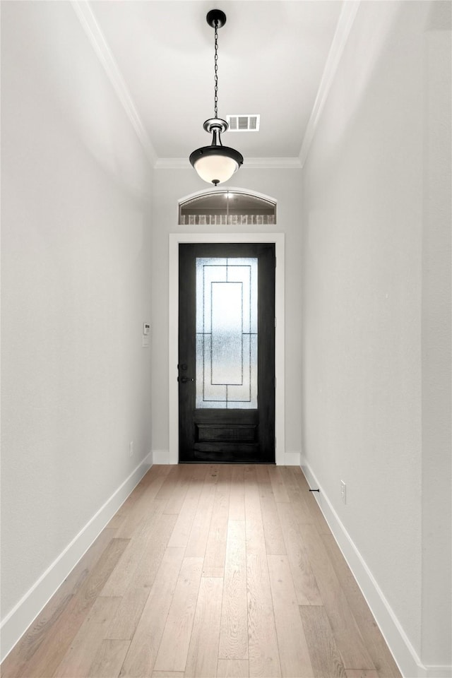 160 Waterview Dr, Gunter, TX 75058 - entrance foyer featuring crown molding, baseboards, light wood-type flooring, and visible vents