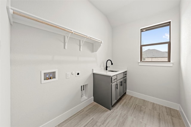 160 Waterview Dr, Gunter, TX 75058 - laundry room featuring laundry area, electric dryer hookup, a sink, baseboards, and hookup for a washing machine