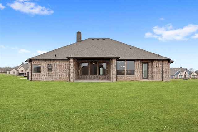 160 Waterview Dr, Gunter, TX 75058 - back of property featuring a yard, ceiling fan, a chimney, and roof with shingles