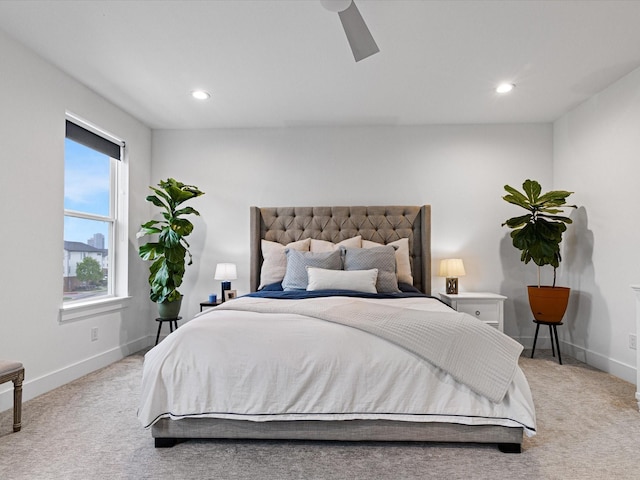 bedroom featuring light carpet, baseboards, a ceiling fan, and recessed lighting