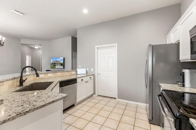 9836 Old Field Dr, Mckinney, TX 75072 - kitchen featuring a sink, appliances with stainless steel finishes, white cabinets, and visible vents