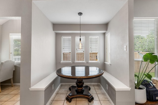 9836 Old Field Dr, Mckinney, TX 75072 - dining space with light tile patterned floors and baseboards