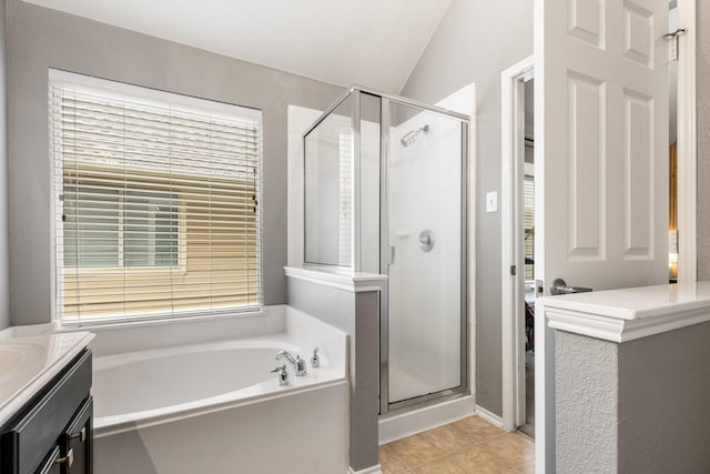 9836 Old Field Dr, Mckinney, TX 75072 - bathroom featuring vanity, tile patterned floors, a stall shower, and a bath