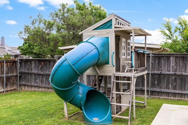 9836 Old Field Dr, Mckinney, TX 75072 - view of play area featuring a yard and a fenced backyard