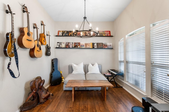 9836 Old Field Dr, Mckinney, TX 75072 - bedroom with an inviting chandelier, baseboards, and wood finished floors
