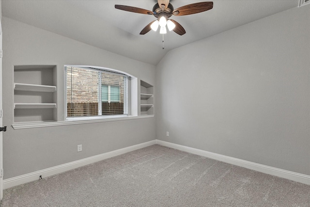 5010 Huffines Blvd, Royse City, TX 75189 - carpeted empty room featuring vaulted ceiling, a ceiling fan, and baseboards