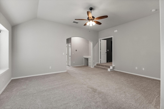 5010 Huffines Blvd, Royse City, TX 75189 - spare room featuring arched walkways, baseboards, visible vents, light colored carpet, and ceiling fan